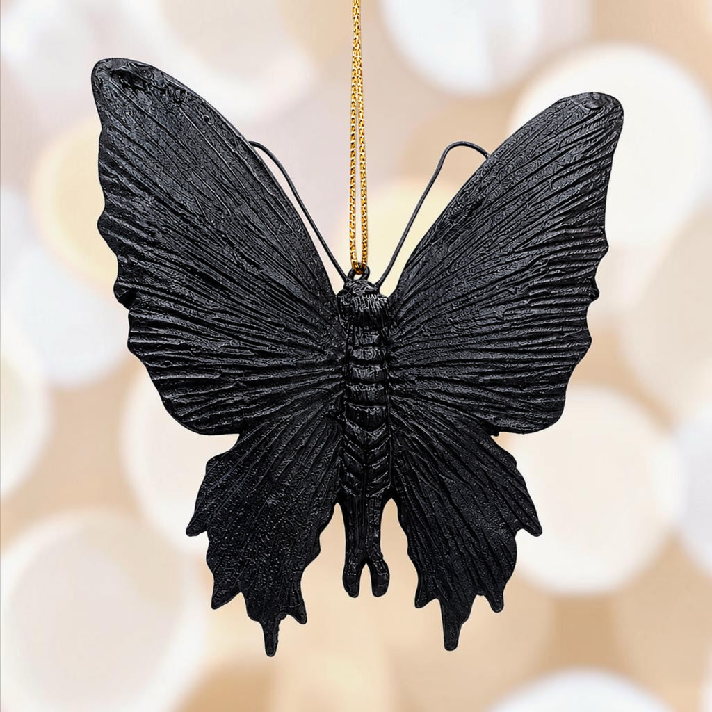 Halloween-Emporium gothic black moth hanging ornament with textured wings and a gold string for display.