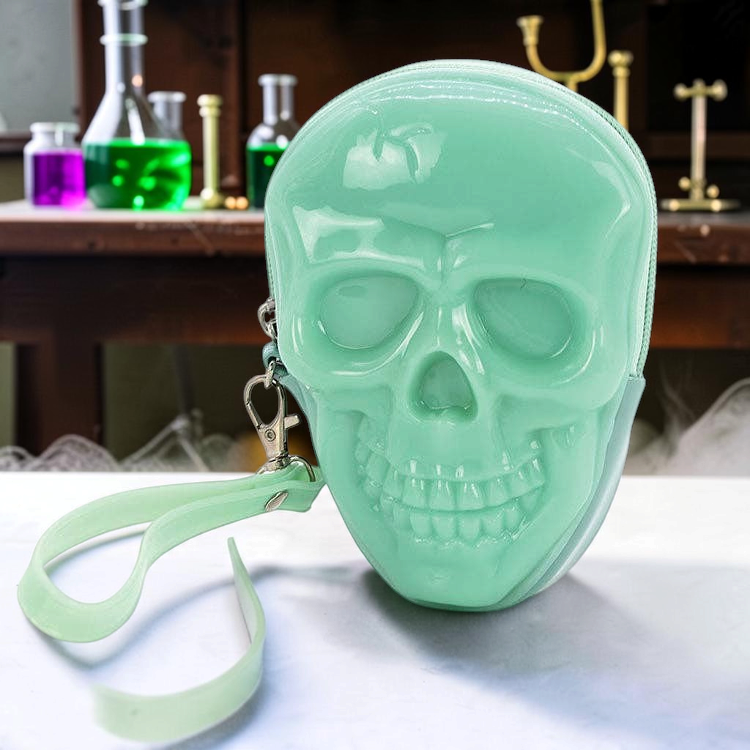 Halloween-Emporium green glow in the dark skull shaped patent vinyl zippered wristlet with a detachable wrist strap