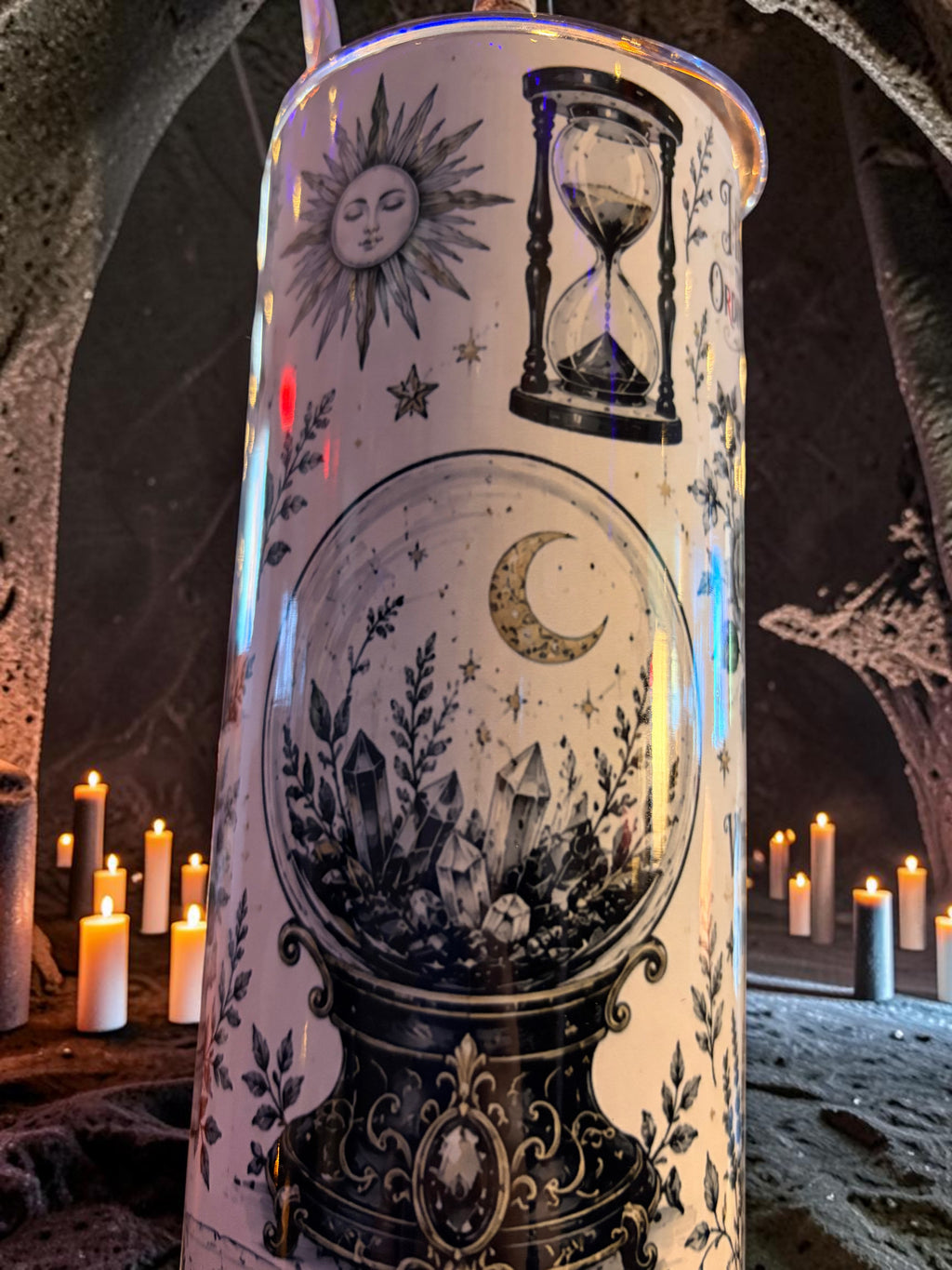 Halloween-Emporium 30oz Grimoire tumbler featuring occult illustrations of a crystal ball, hourglass, and sun.
