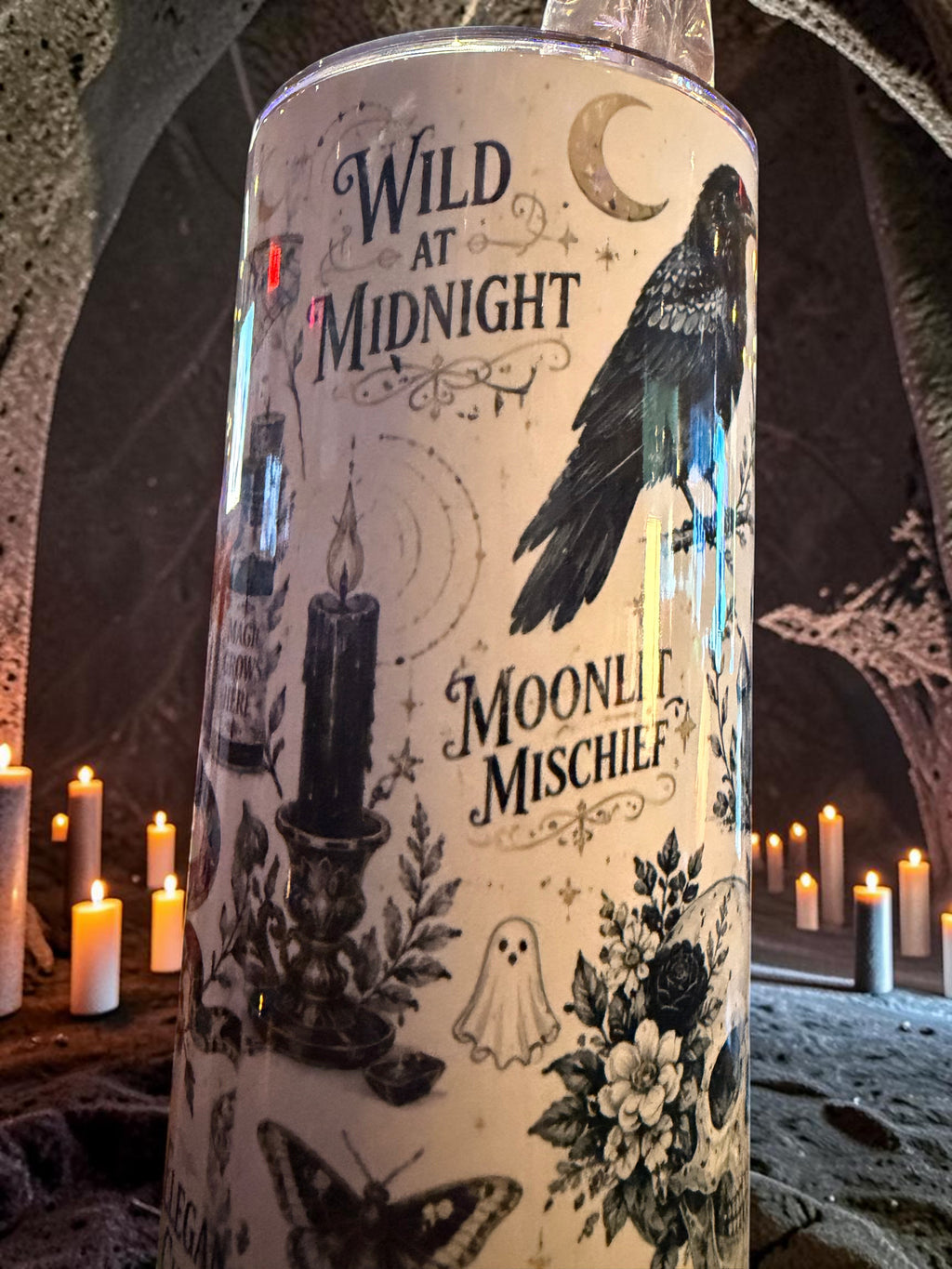 Halloween-Emporium 30oz Grimoire Tumbler featuring raven, candle, and skull illustrations in a dark occult aesthetic.