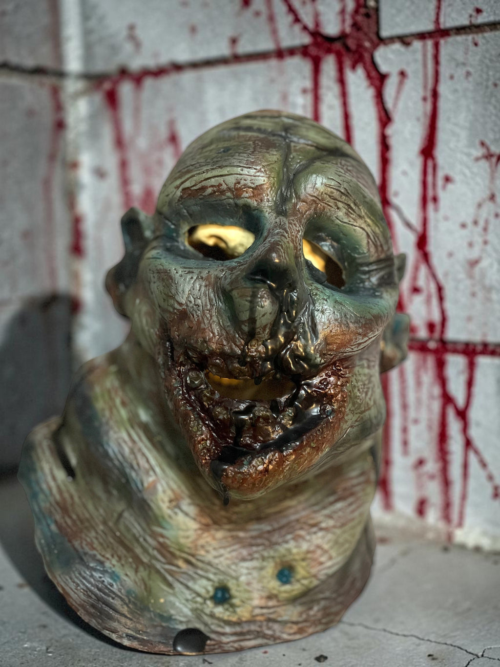 Halloween-Emporium Las Vegas Undead Gus hand-painted latex zombie mask with realistic decaying skin and textures.