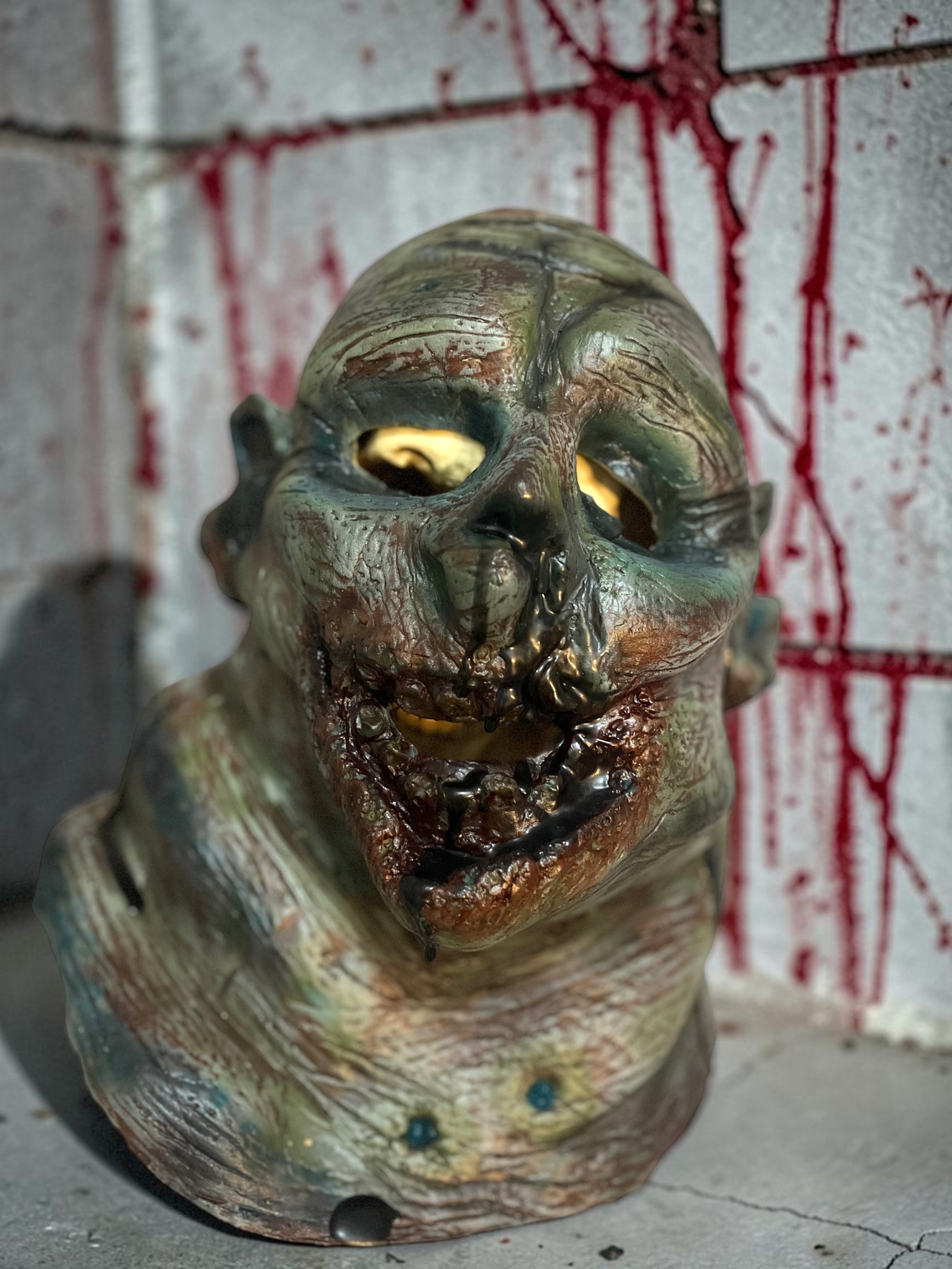 Halloween-Emporium Las Vegas Undead Gus hand-painted latex zombie mask with realistic decaying skin and textures.