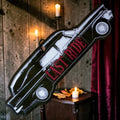 Halloween-Emporium Hearse Last Ride air freshener with gothic car silhouette and red text hanging in a candlelit room
