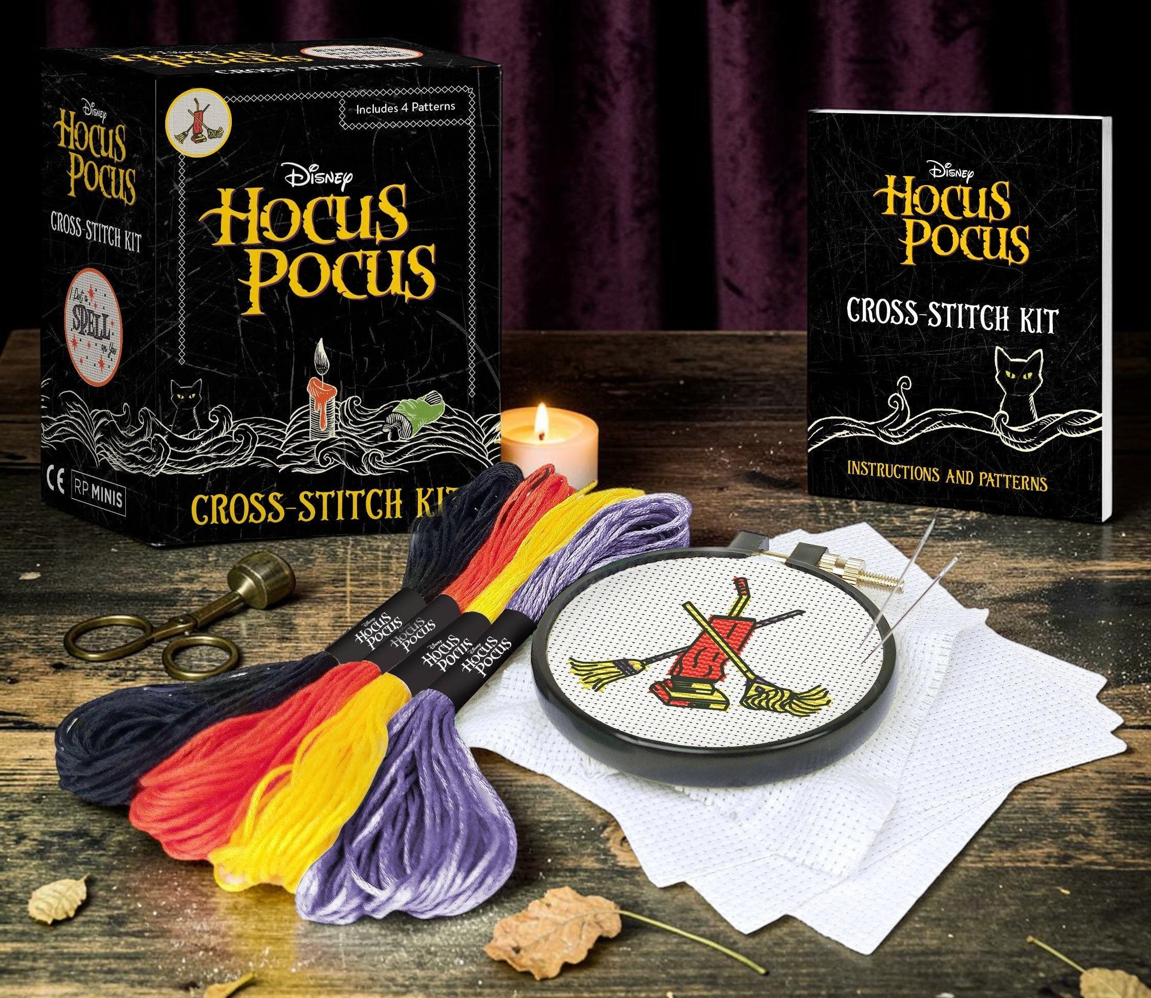 Halloween-Emporium Disney Hocus Pocus cross stitch kit with embroidery hoop, cotton Aida cloth, needles, and thread.