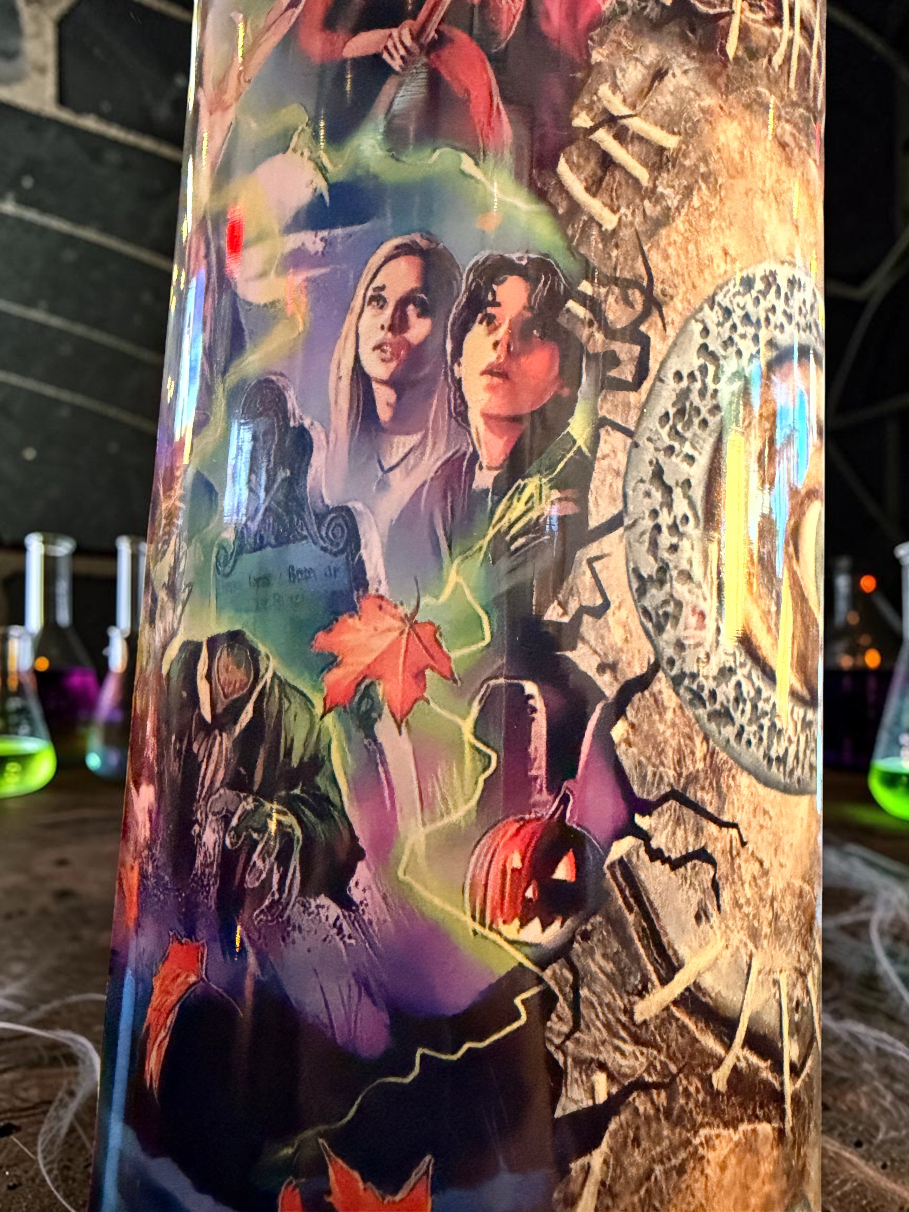 Halloween-Emporium 30oz tumbler featuring a Hocus Pocus sisterly trio print with pumpkins and autumn leaves
