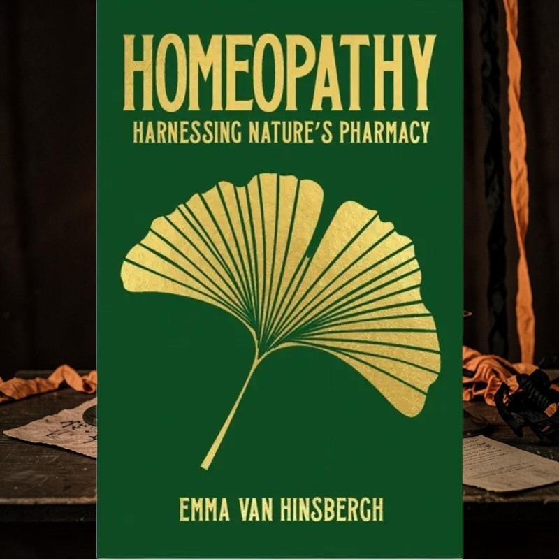 Halloween-Emporium Homeopathy hardback book with a green cover and gold ginkgo leaf illustration.