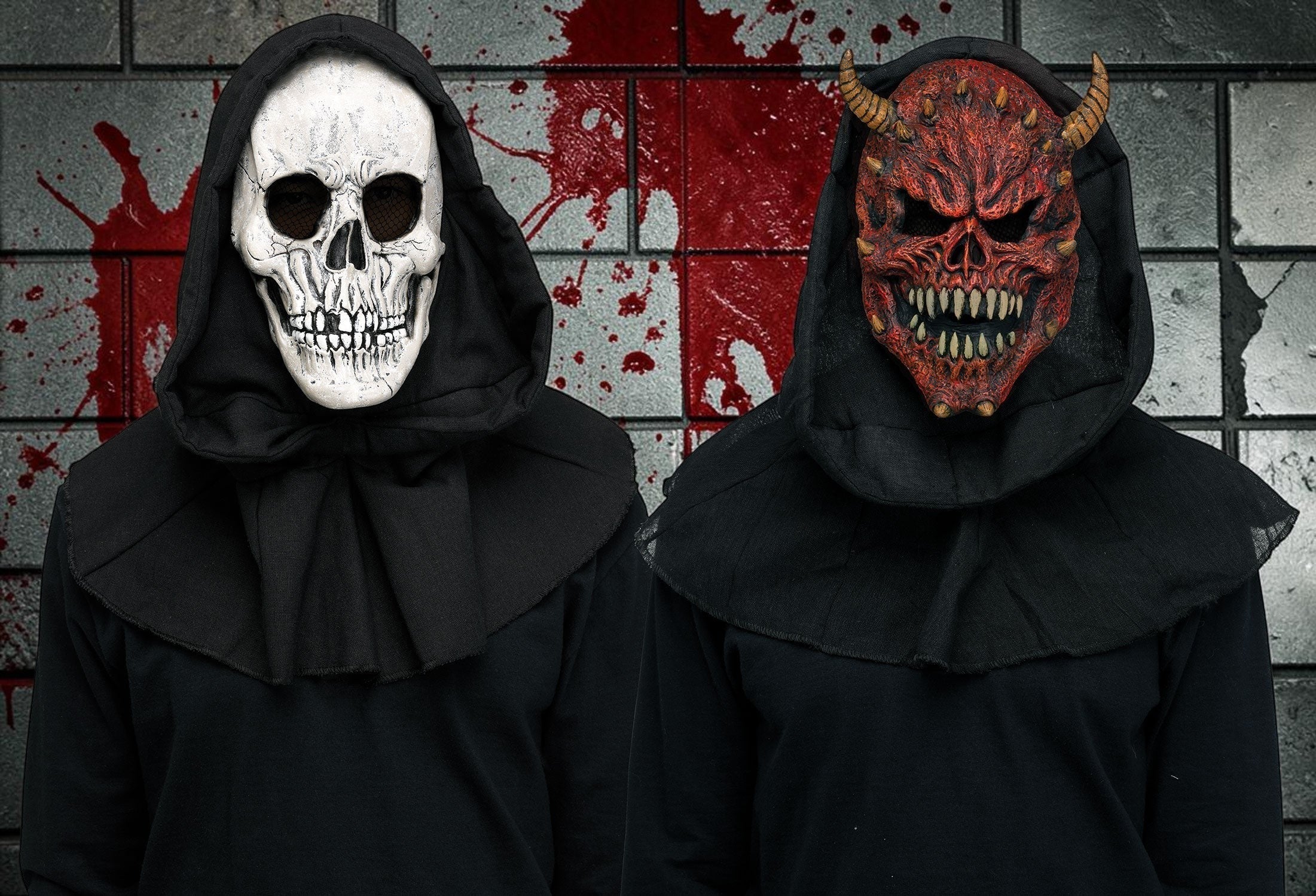 Halloween-Emporium grim reaper and demon horror masks with black hoods against a blood-splattered brick wall background.