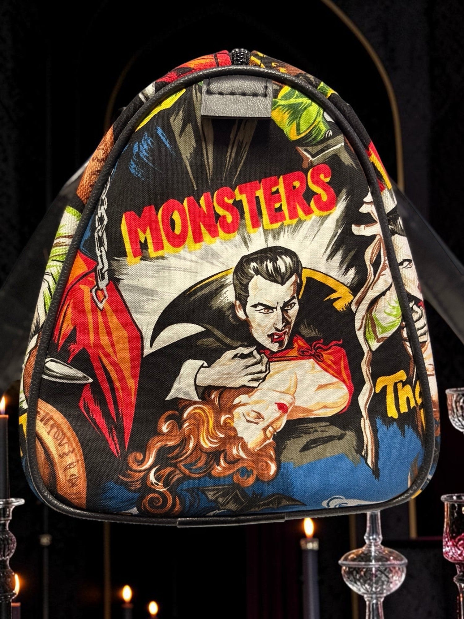 Halloween-Emporium classic horror handbag featuring vintage monster comic book art with Dracula on a black background