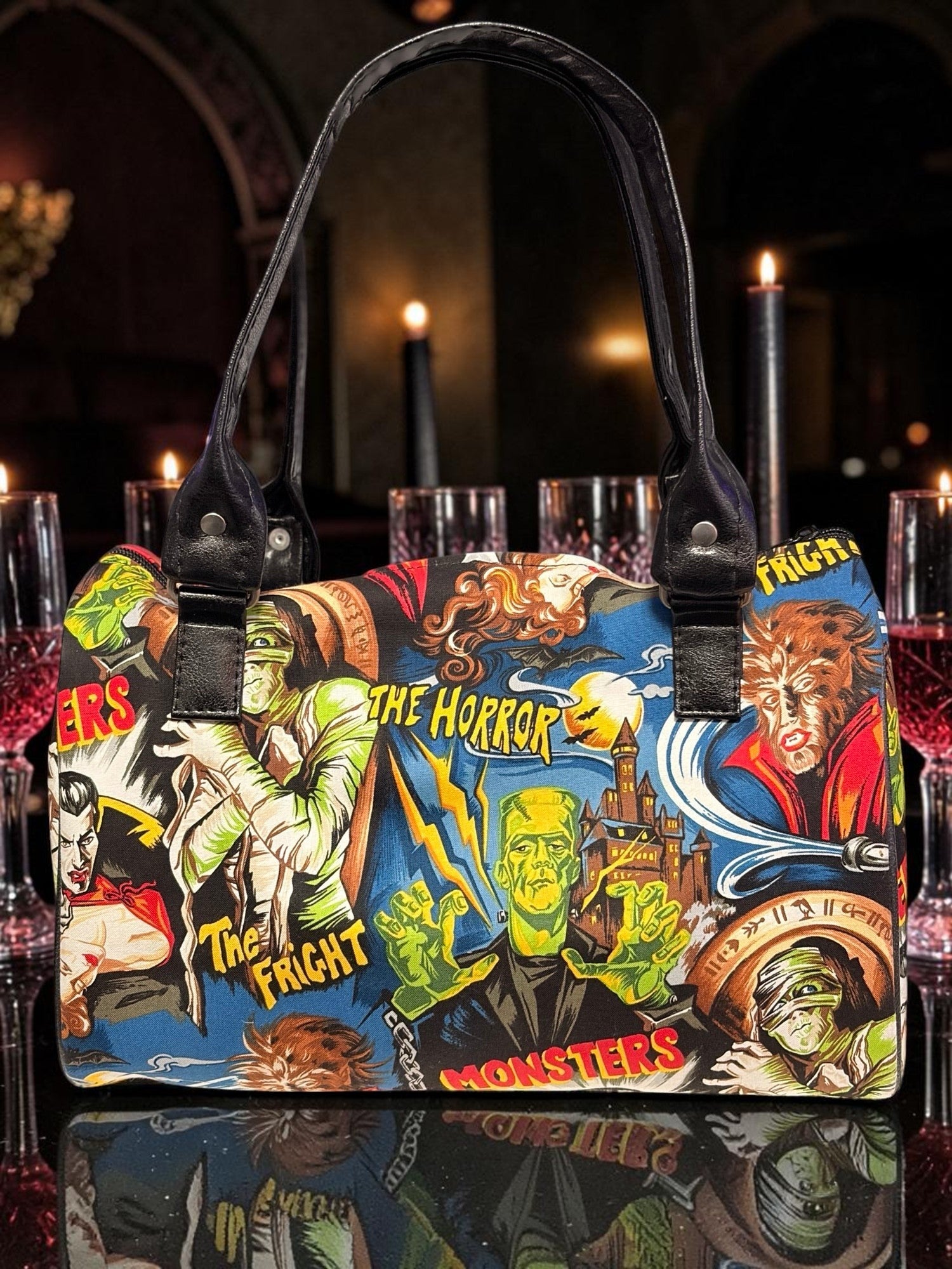 Halloween-Emporium handbag featuring a colorful vintage classic horror monster movie comic book print