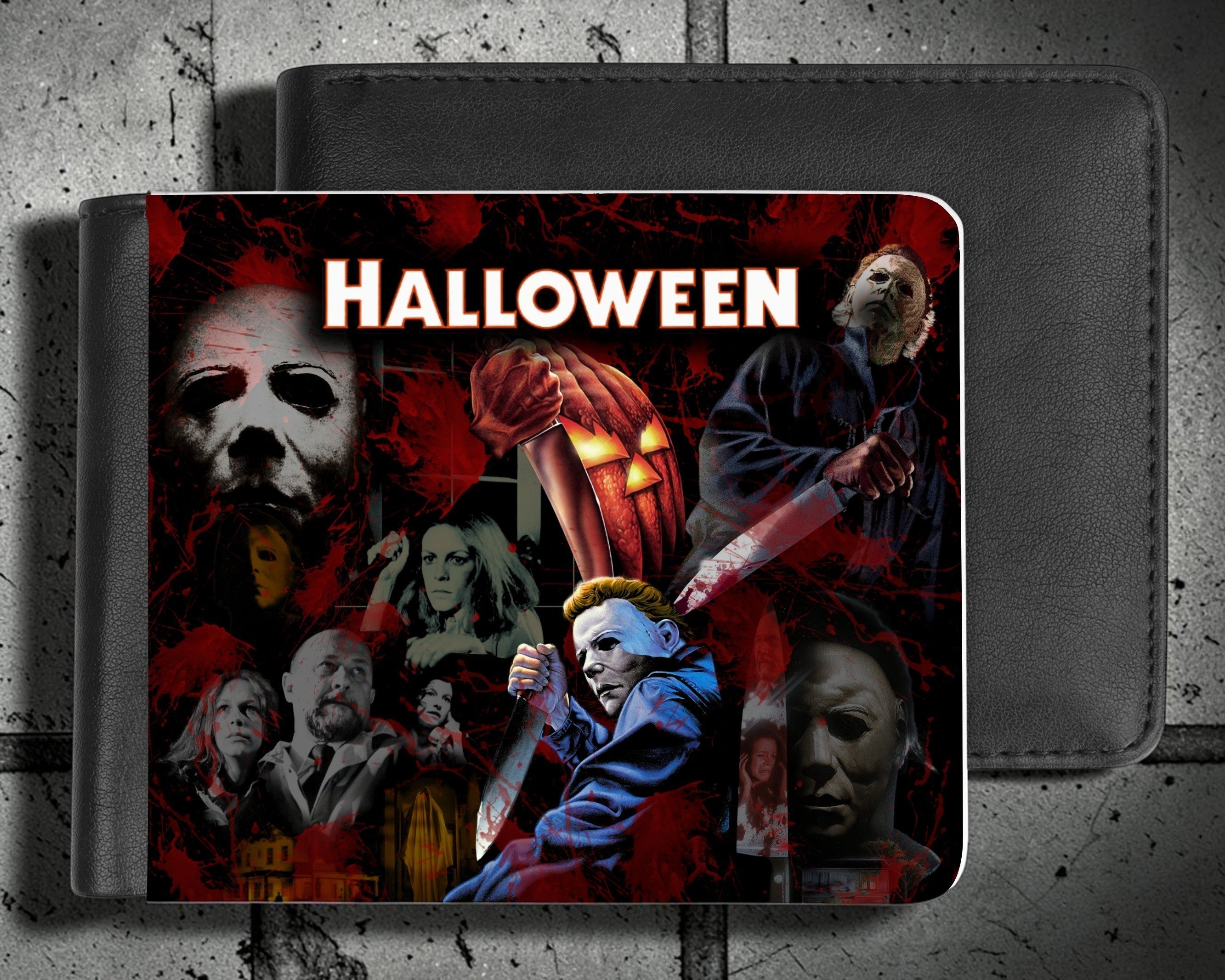 Halloween-Emporium bi-fold wallet featuring a Michael Myers horror movie collage in vibrant red and black synthetic leather