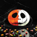Halloween-Emporium jack-o-lantern crossbody bag with split orange and white pumpkin face design and shoulder strap.