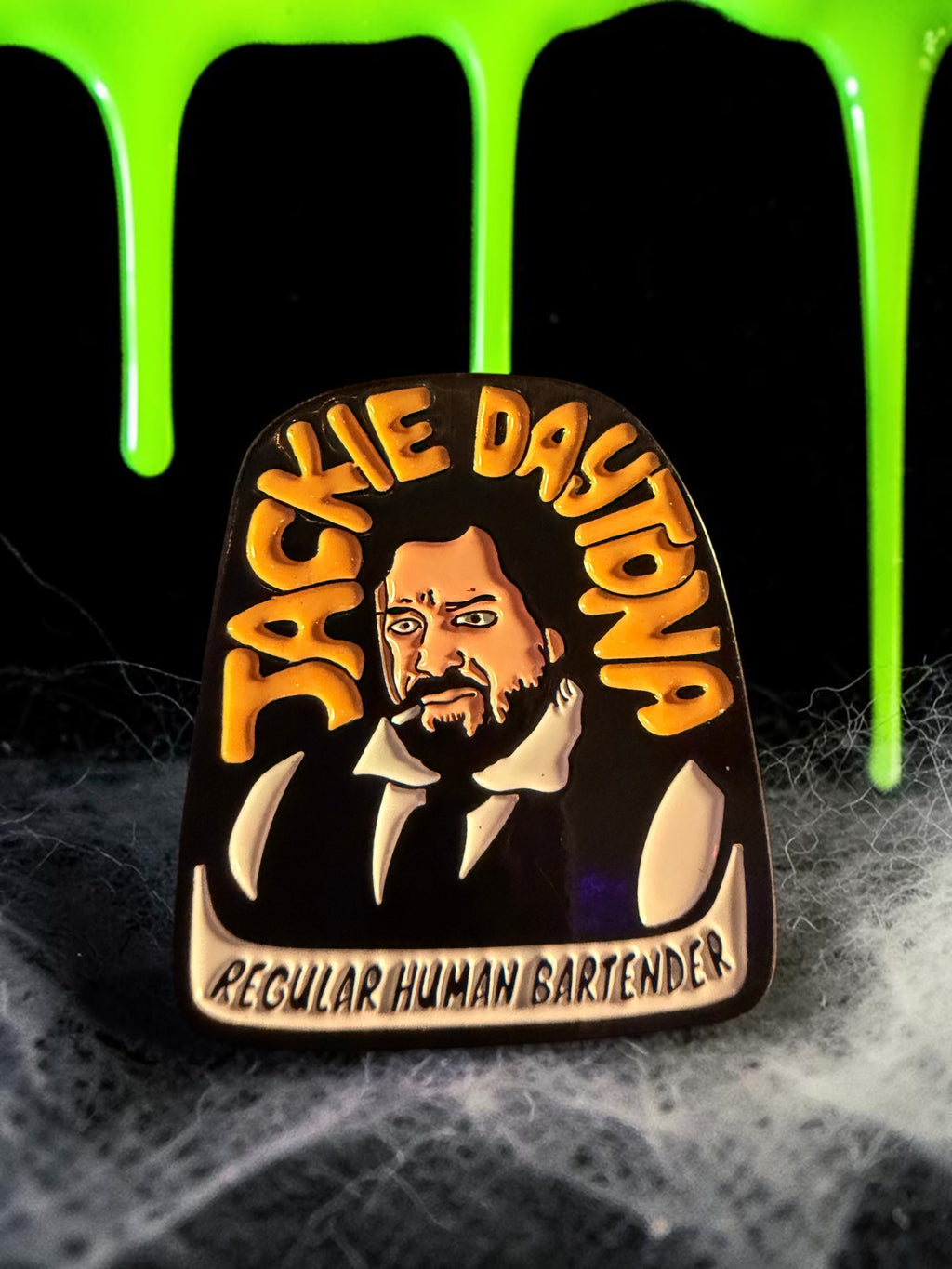 Halloween-Emporium Jackie Daytona enamel pin featuring the Regular Human Bartender character from What We Do in the Shadows
