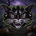 Halloween-Emporium Kattitude embroidered iron-on patch featuring a snarling black cat with purple and lime green accents.