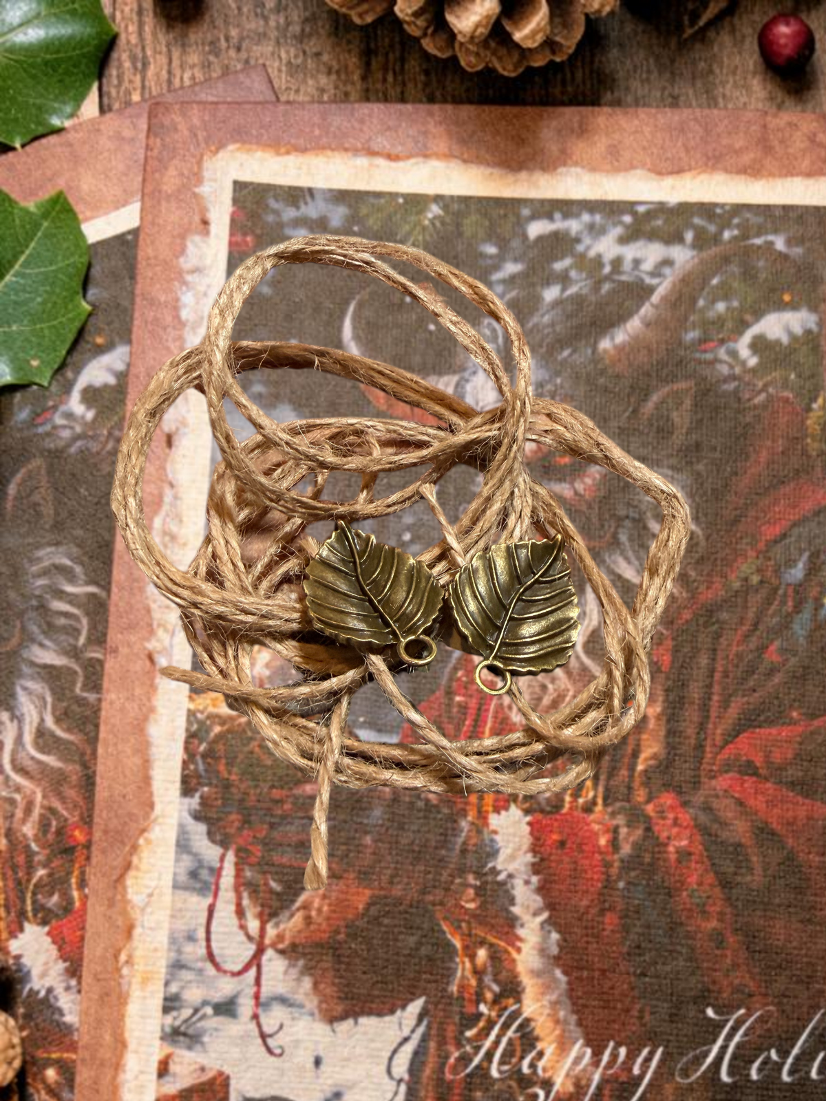 Halloween-Emporium Krampus greeting card set featuring rustic twine and antique bronze leaf charms on vintage paper