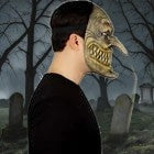 Halloween-Emporium handmade latex Majo horror mask with sharp teeth and long nose worn in profile view