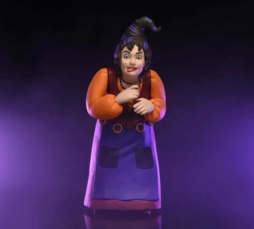 Halloween-Emporium NECA Mary Sanderson figure with orange sleeves and purple apron on a dark purple background