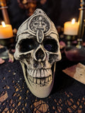 Halloween-Emporium Mayan temple skull figurine with weathered bone finish and intricate deity carving on forehead.