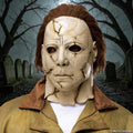 Halloween-Emporium adult Michael Myers mask with distressed cracked latex finish and brown synthetic hair