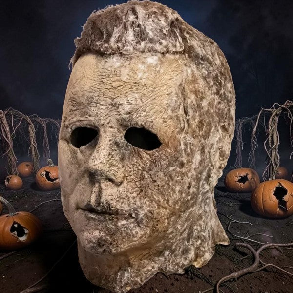 Halloween-Emporium Michael Myers mask from Halloween Ends with weathered, decaying skin texture and realistic hair.