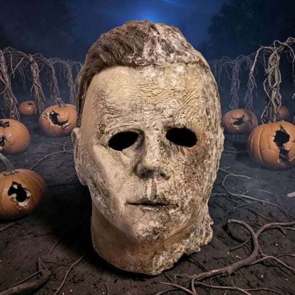 Halloween-Emporium Michael Myers mask from Halloween Ends with weathered, decaying skin texture and realistic hair.