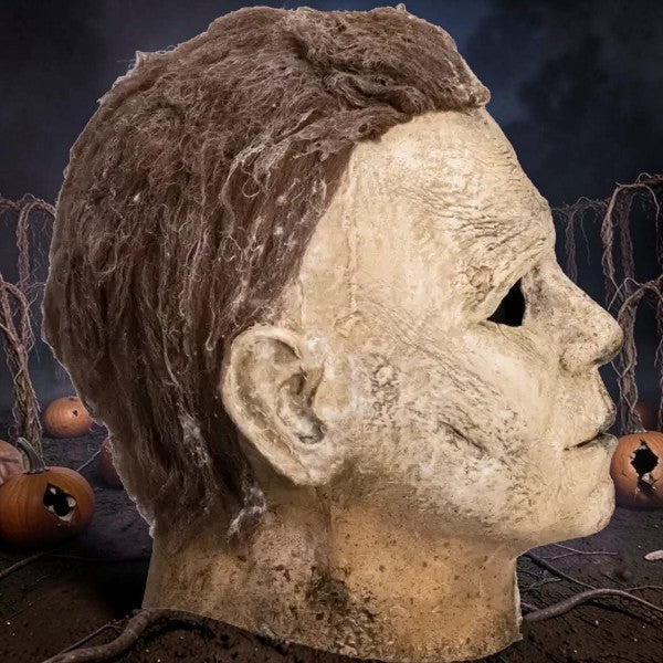 Halloween-Emporium Michael Myers mask from Halloween Ends with weathered, decaying skin texture and realistic hair.