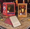 Halloween-Emporium miniature Zoltar fortune teller collectible with light-up booth, sound, and fortune cards on table.