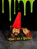 Halloween-Emporium Nando the Relentless enamel pin featuring a vampire in a red wizard hat with text Now I am a Wizard