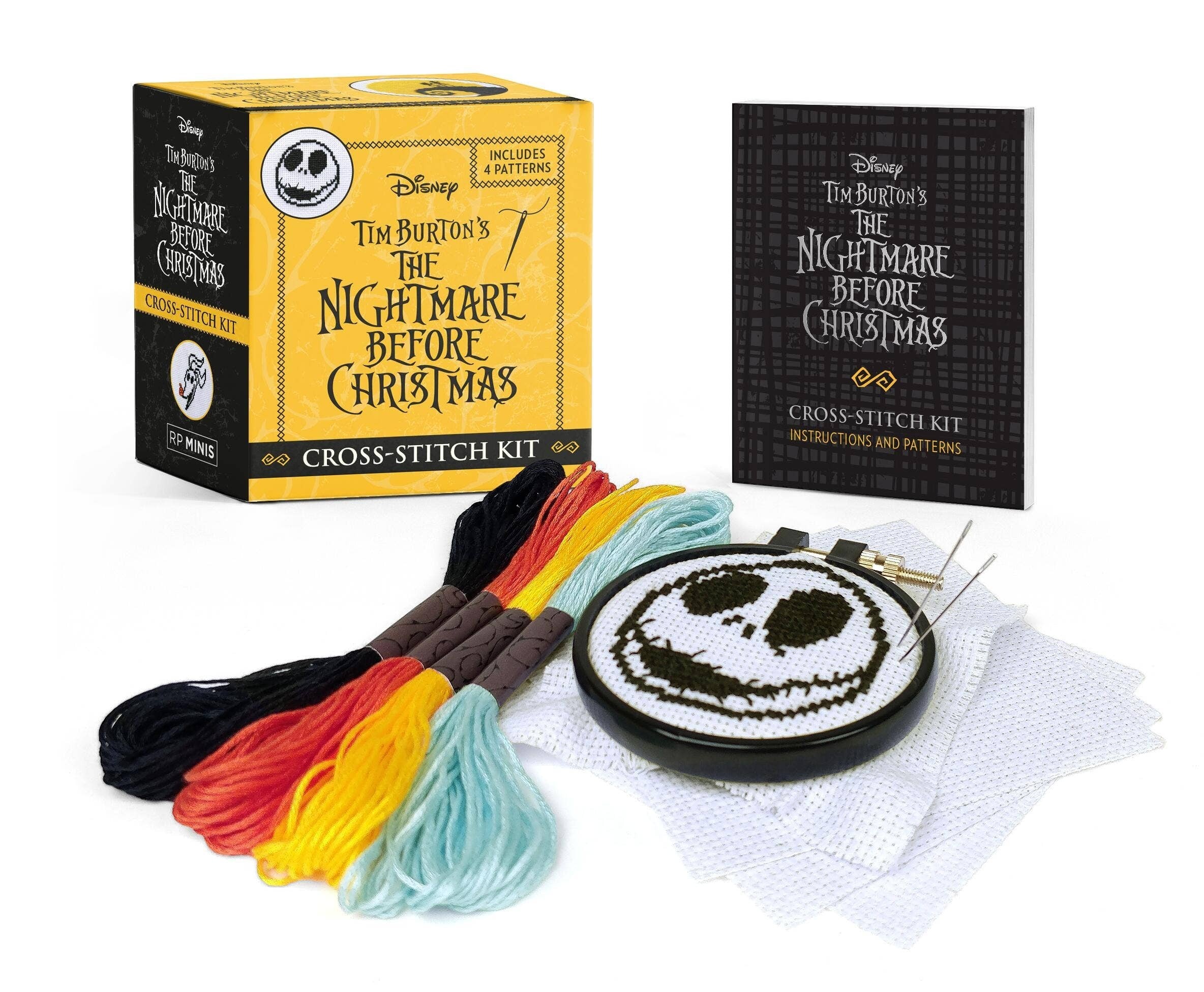 Halloween-Emporium Disney Nightmare Before Christmas cross-stitch kit with embroidery hoop, thread, and pattern book.