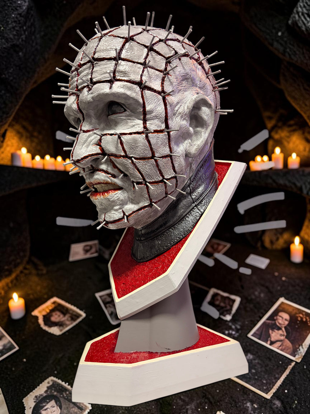Halloween-Emporium hand painted Pinhead bust with realistic gore, metallic pins, and a textured red and white base.