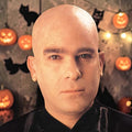 Halloween-Emporium professional latex bald cap worn by a man for a realistic costume transformation