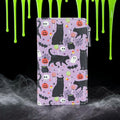 Halloween-Emporium purple vinyl wallet featuring a black cat, pumpkin, and ghost collage pattern with RFID protection.