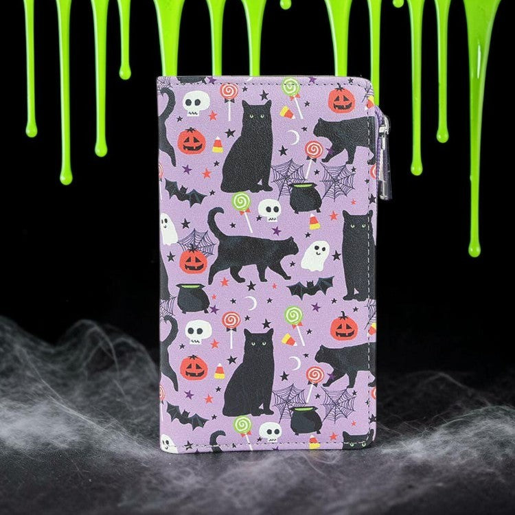 Halloween-Emporium purple vinyl wallet featuring a black cat, pumpkin, and ghost collage pattern with RFID protection.