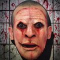 Halloween-Emporium realistic latex human face mask with gruesome blood-stained skin texture and haunting expression.
