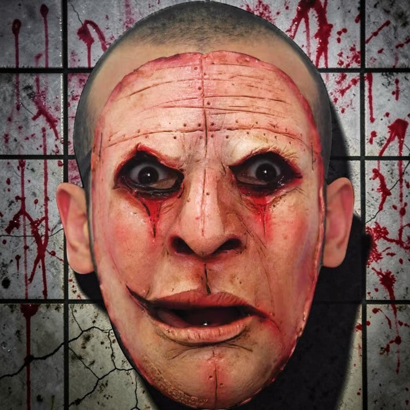 Halloween-Emporium realistic latex human face mask with gruesome blood-stained skin texture and haunting expression.