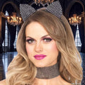 Halloween-Emporium black rhinestone cat ear headband and matching choker worn by a blonde woman in a ballroom setting.