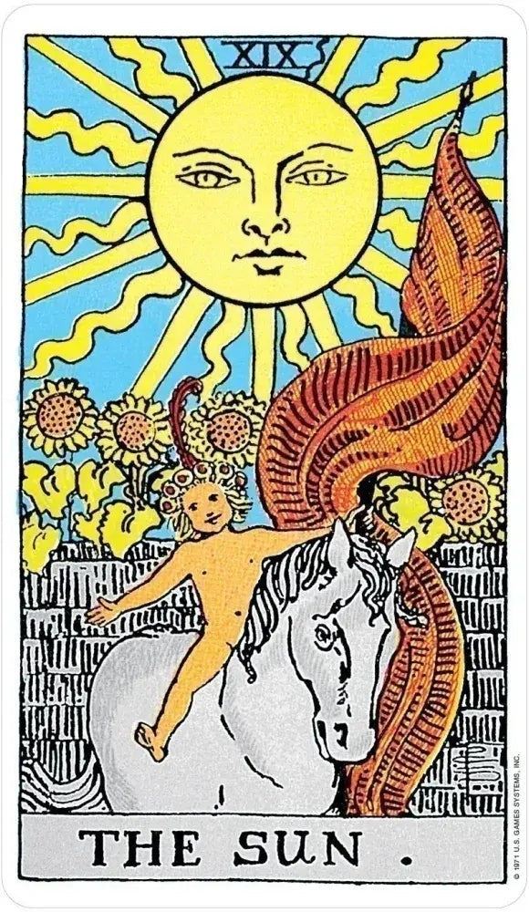 Halloween-Emporium Rider-Waite The Sun tarot card featuring a child on a white horse under a radiant sun and sunflowers