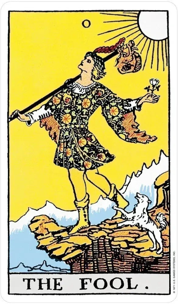 The Fool tarot card from the Halloween-Emporium Rider-Waite deck featuring a traveler with a white rose and dog.