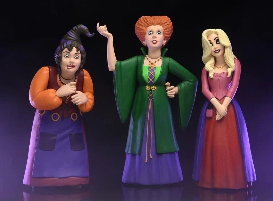 Halloween-Emporium Sanderson Sisters figure set by NECA featuring Winifred, Sarah, and Mary in iconic movie outfits.