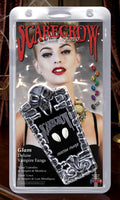 Halloween-Emporium Scarecrow Glam Deluxe chrome vampire fangs in blister pack packaging with model photo