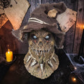 Halloween-Emporium terrifying scarecrow latex mask with weathered burlap texture, stitched mouth, and rustic hat