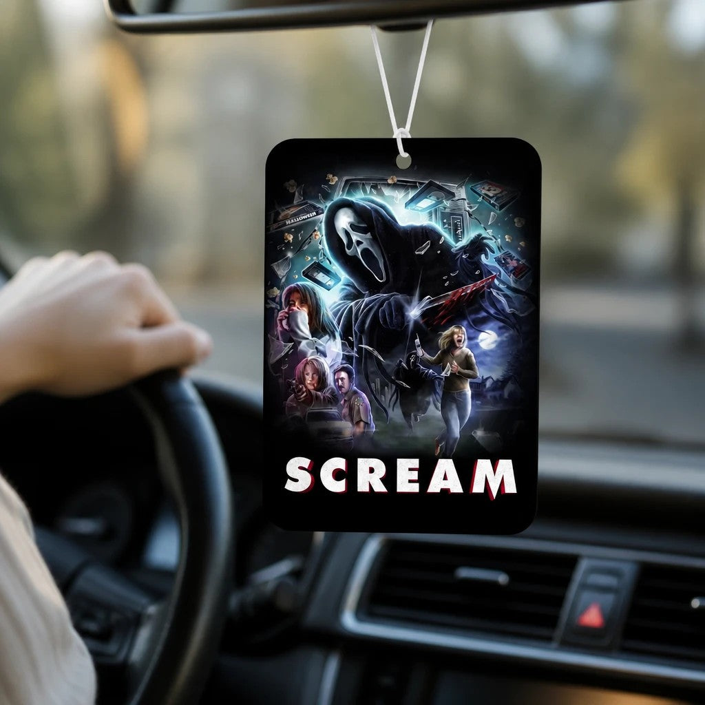 Halloween-Emporium Scream movie themed car air freshener with Ghostface design hanging from a rearview mirror