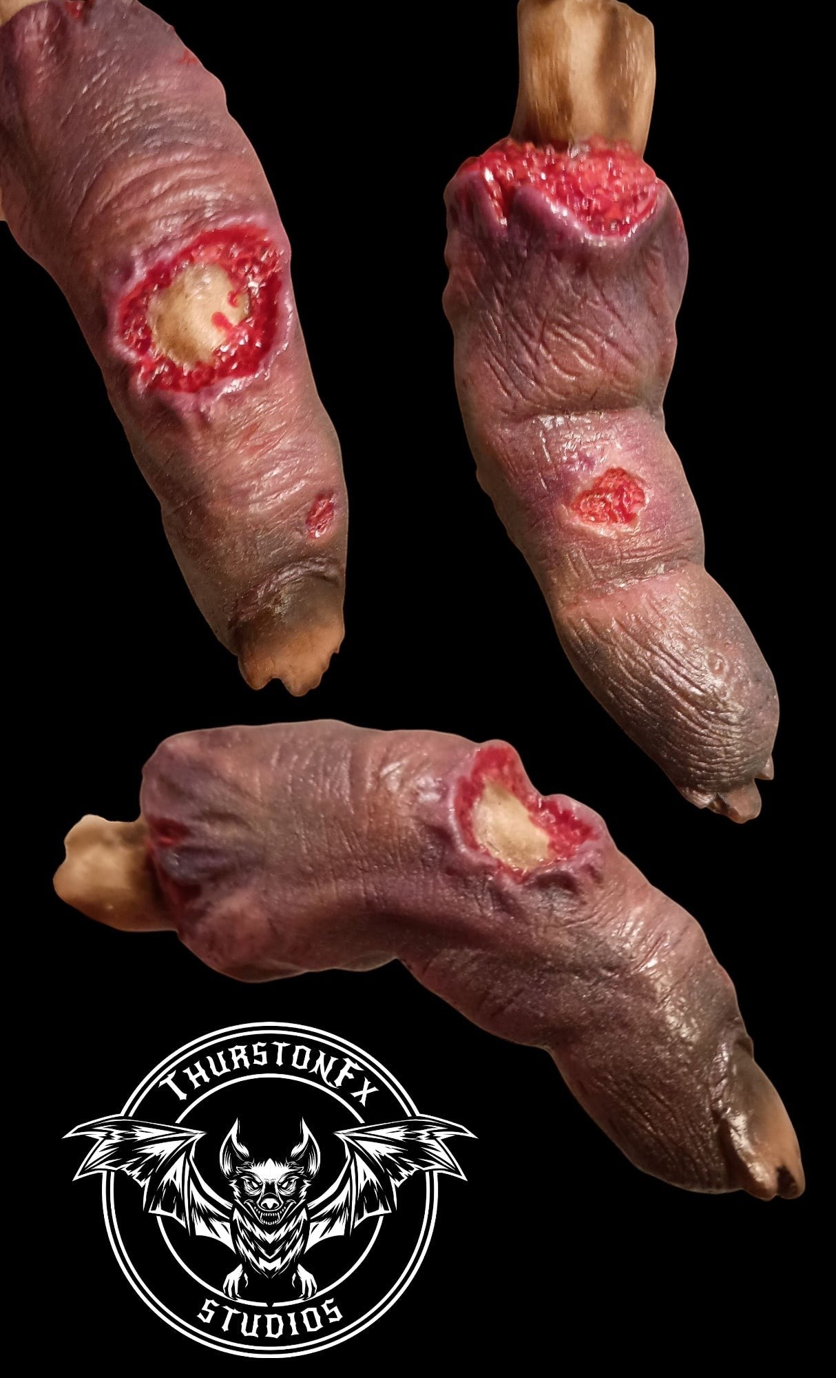 Halloween-Emporium ThurstonFX Studios severed finger keychain with hyper-realistic flesh tones and gruesome detail.