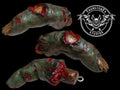 Halloween-Emporium THURSTONFX STUDIOS severed green zombie finger keychain with realistic decaying skin and bloody wounds.