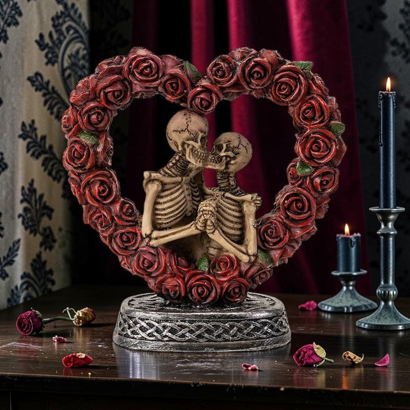 Halloween-Emporium Love Never Dies skeleton couple figurine inside a red rose heart on a Celtic knotwork base.