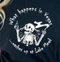Halloween-Emporium black cotton crewneck t-shirt featuring a white skeleton graphic with dark humor text