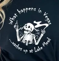 Halloween-Emporium black cotton crewneck t-shirt featuring a white skeleton graphic with dark humor text.