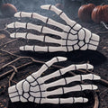 Halloween-Emporium white skeleton bone hand hairslides with black detailing, perfect for gothic or spooky hairstyles.