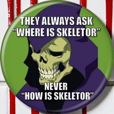 Halloween-Emporium Masters of the Universe Skeletor meme button featuring a purple and green 1.25 inch round pin.