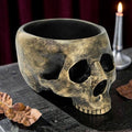 Halloween-Emporium decorative resin skull bowl with a weathered antique gold and black finish for spooky table decor.