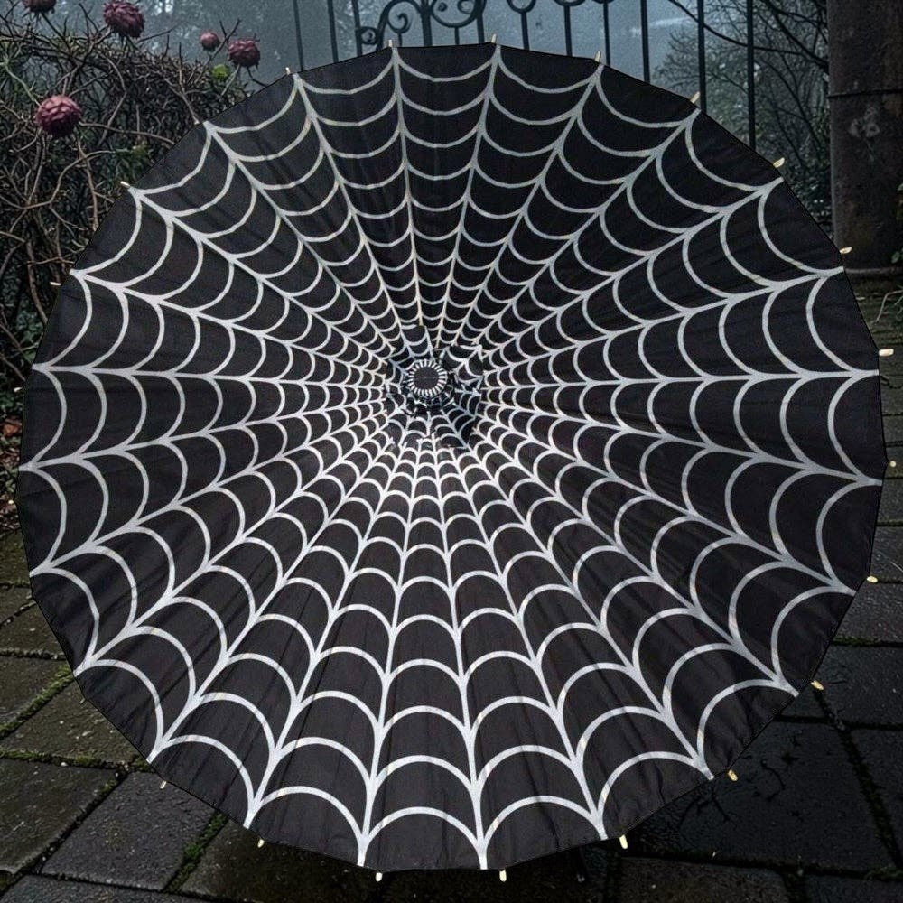 Halloween-Emporium gothic parasol featuring a white spider web print on a black canopy with a wooden frame